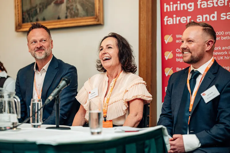 Panellists sharing a laugh during the discussion