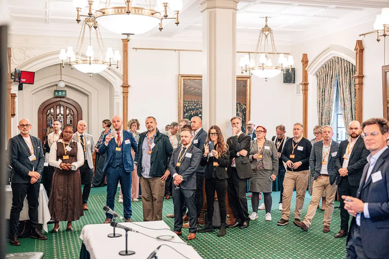 Guests gathered in the Churchill Room at the House of Commons